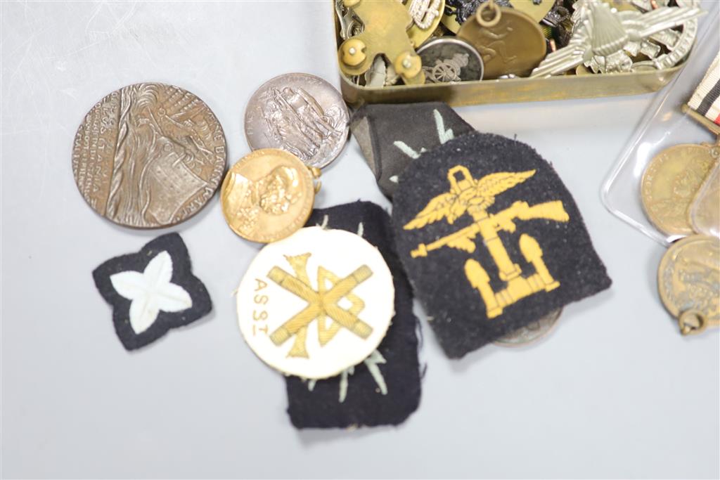 A quantity of Military and Civilian medals / badges